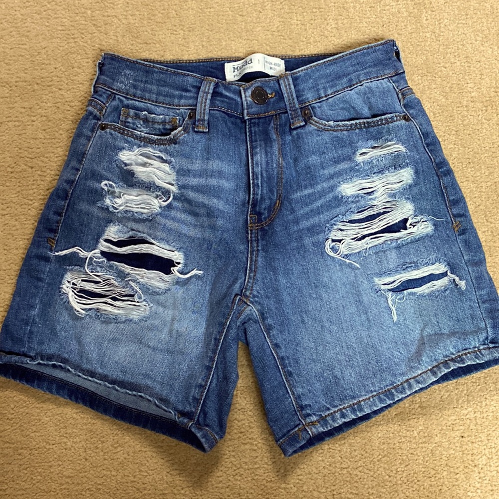 Mid thigh ripped jean shorts